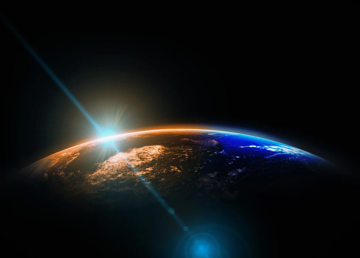 宇宙から見た地球と日の出